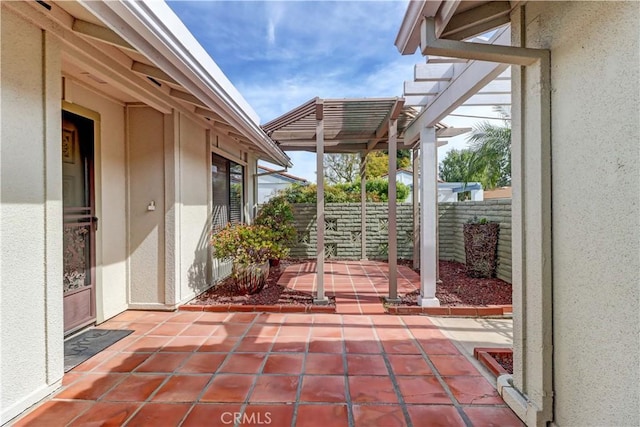 view of patio with fence