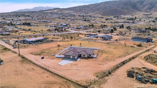 bird's eye view with a rural view and a mountain view