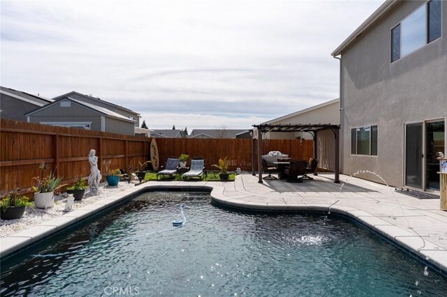 view of swimming pool featuring a patio, a fenced backyard, a fenced in pool, and a pergola