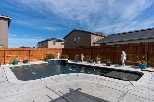 view of swimming pool with a fenced in pool, a fenced backyard, and a patio