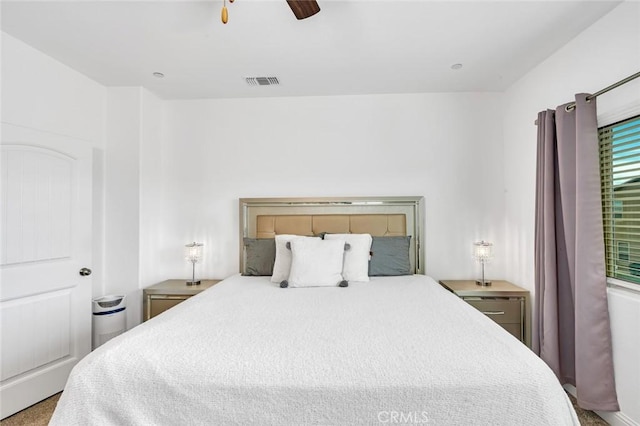 bedroom with a ceiling fan and visible vents