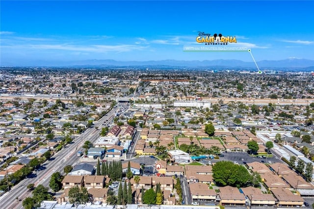 birds eye view of property featuring a residential view and a mountain view