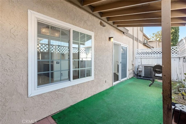 view of patio / terrace with fence