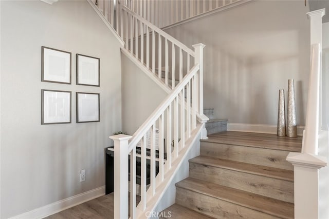25499 Foxglove Ln, Corona, CA 92883 - staircase with baseboards and wood finished floors