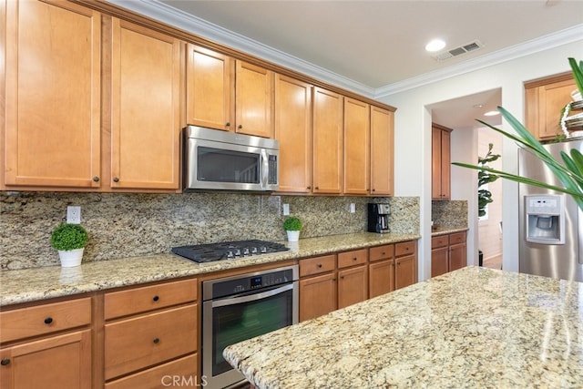 25499 Foxglove Ln, Corona, CA 92883 - kitchen with light stone counters, visible vents, crown molding, tasteful backsplash, and appliances with stainless steel finishes