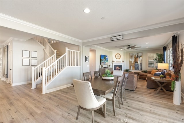 25499 Foxglove Ln, Corona, CA 92883 - dining room with recessed lighting, wood finished floors, stairs, and ornamental molding