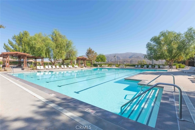 25499 Foxglove Ln, Corona, CA 92883 - pool with a mountain view, a patio area, and a pergola