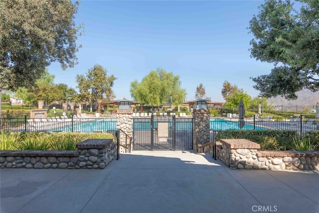 25499 Foxglove Ln, Corona, CA 92883 - pool featuring fence and a patio