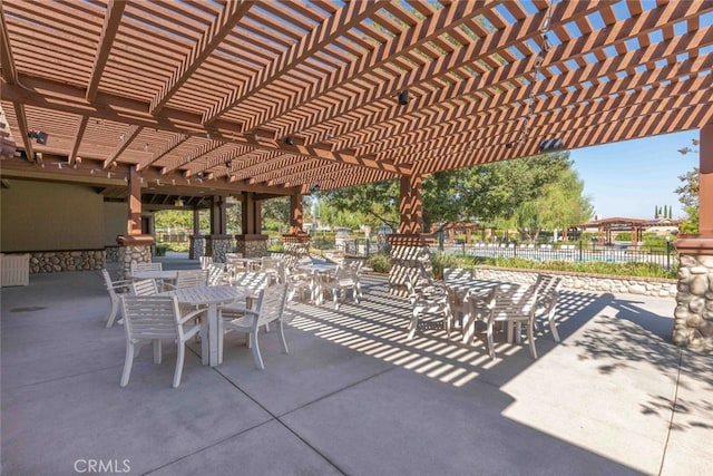 25499 Foxglove Ln, Corona, CA 92883 - view of patio featuring fence, a pergola, and outdoor dining area