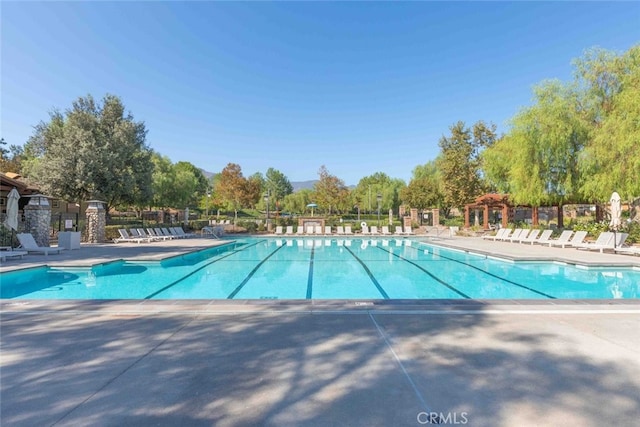 25499 Foxglove Ln, Corona, CA 92883 - community pool with fence and a patio