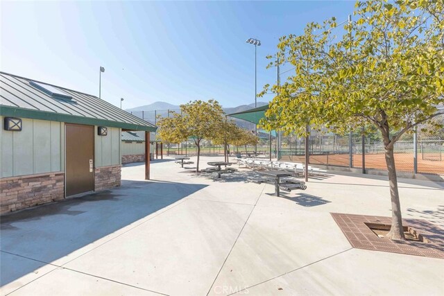 25499 Foxglove Ln, Corona, CA 92883 - view of patio / terrace featuring fence and a mountain view