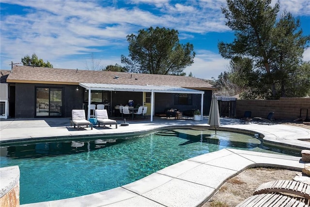 view of swimming pool with a patio, a fenced backyard, and a fenced in pool