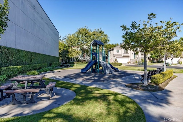 community playground featuring a yard