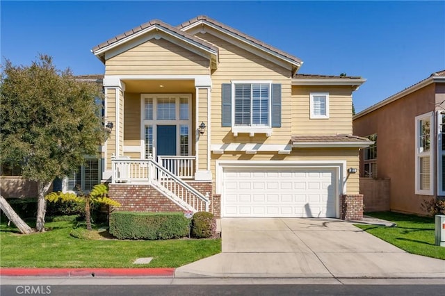 view of front of home featuring a garage, driveway, a front lawn, and brick siding