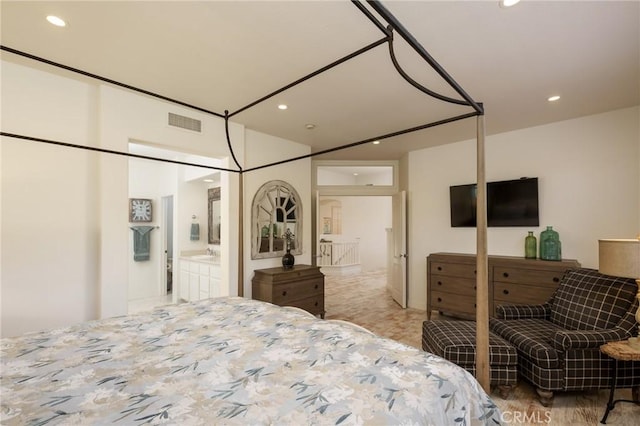 bedroom featuring recessed lighting and visible vents