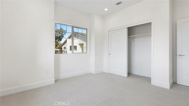 366 S Halcyon Rd, Arroyo Grande, CA 93420 - unfurnished bedroom featuring light colored carpet, a closet, and recessed lighting