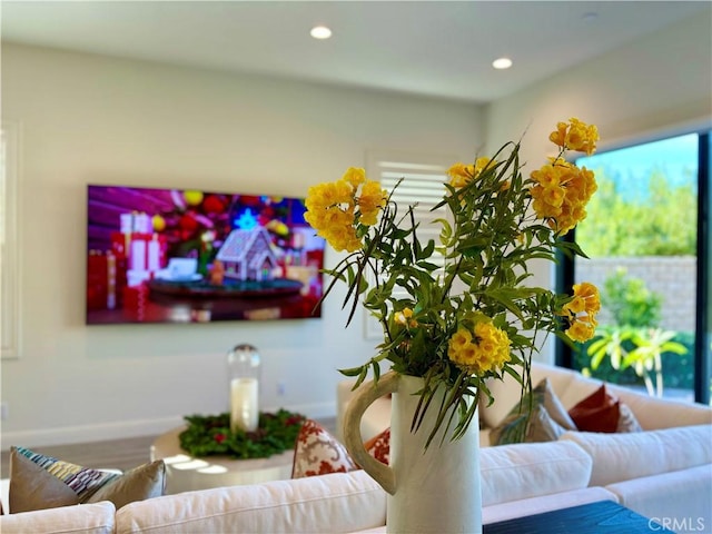 interior space featuring baseboards and recessed lighting