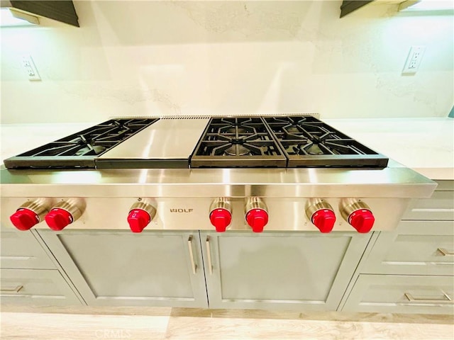 interior space featuring stainless steel gas stovetop