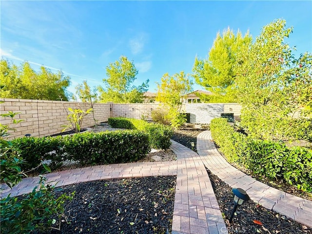 view of yard featuring a fenced backyard