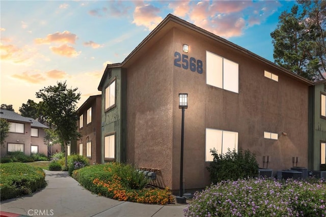 2568 Avenida Del Vis Unit 203, Corona, CA 92882 - view of home's exterior featuring stucco siding