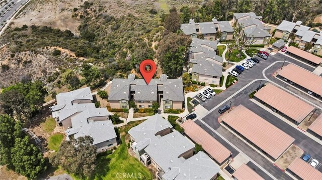 2568 Avenida Del Vis Unit 203, Corona, CA 92882 - aerial view of property and surrounding area featuring nearby suburban area