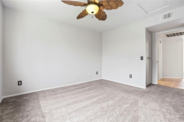 2568 Avenida Del Vis Unit 203, Corona, CA 92882 - unfurnished room featuring carpet floors, a ceiling fan, attic access, and baseboards