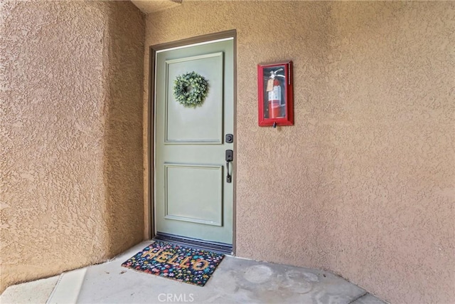 2568 Avenida Del Vis Unit 203, Corona, CA 92882 - view of exterior entry with stucco siding