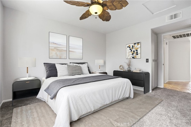 2568 Avenida Del Vis Unit 203, Corona, CA 92882 - carpeted bedroom featuring attic access, ceiling fan, and baseboards