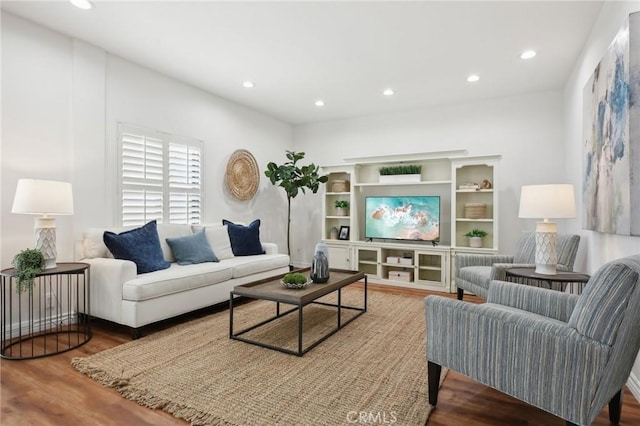 living area featuring recessed lighting and wood finished floors