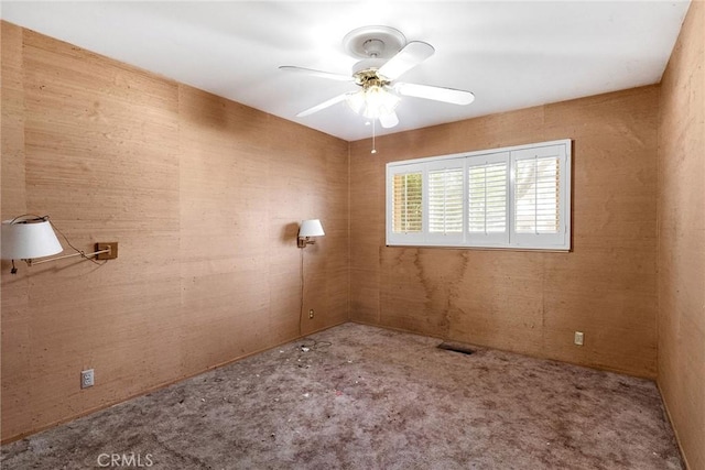 spare room featuring ceiling fan