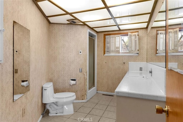 bathroom featuring a stall shower, visible vents, toilet, tile patterned floors, and vanity