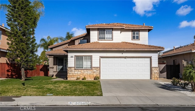 view of front of home featuring a garage, stone siding, a tile roof, fence, and a front lawn