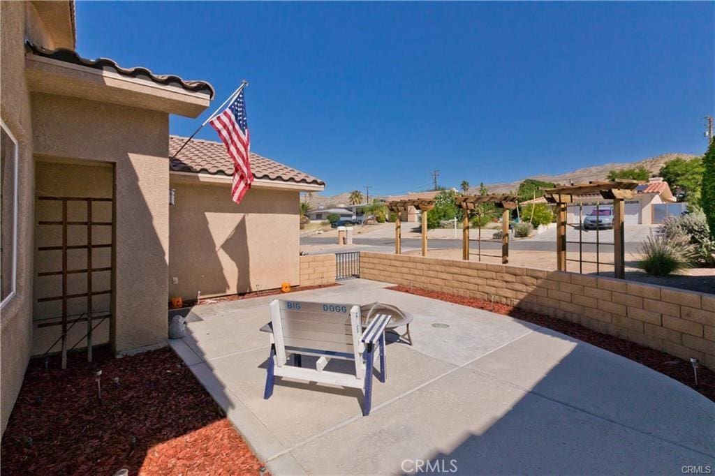 view of patio with a residential view