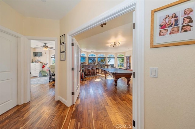 hall featuring wood finished floors