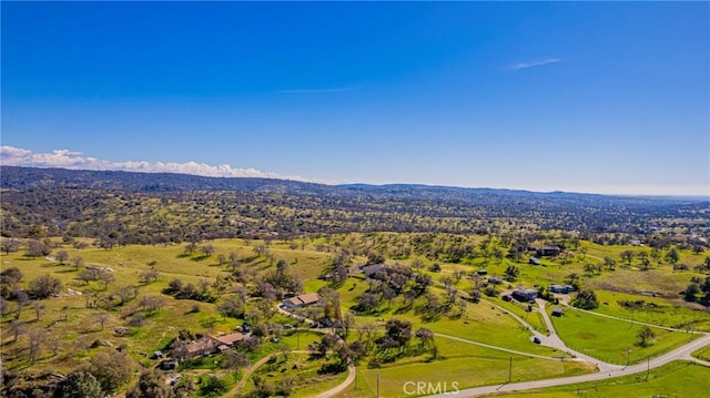 aerial view with a forest view and a mountain view