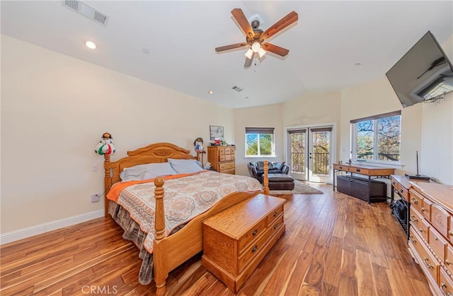 bedroom with visible vents, baseboards, access to exterior, french doors, and light wood-type flooring