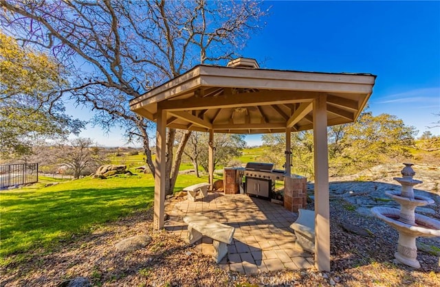 view of yard featuring a patio area and a gazebo