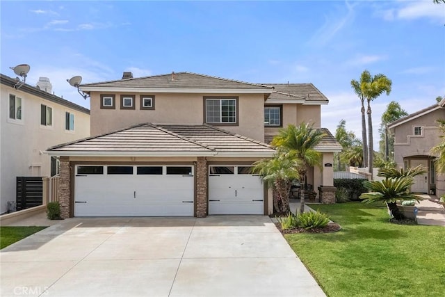 traditional-style home with driveway, a front lawn, fence, and a tiled roof