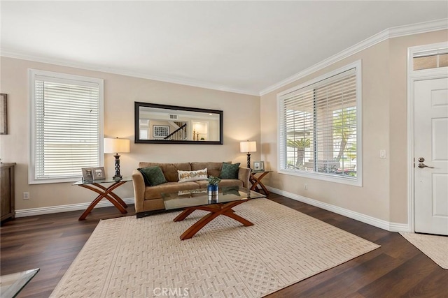 living room with ornamental molding, plenty of natural light, dark wood finished floors, and baseboards