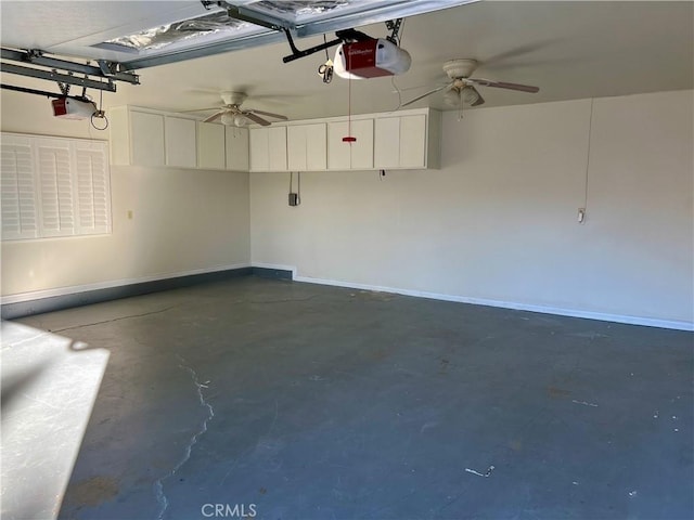 garage featuring baseboards and a garage door opener