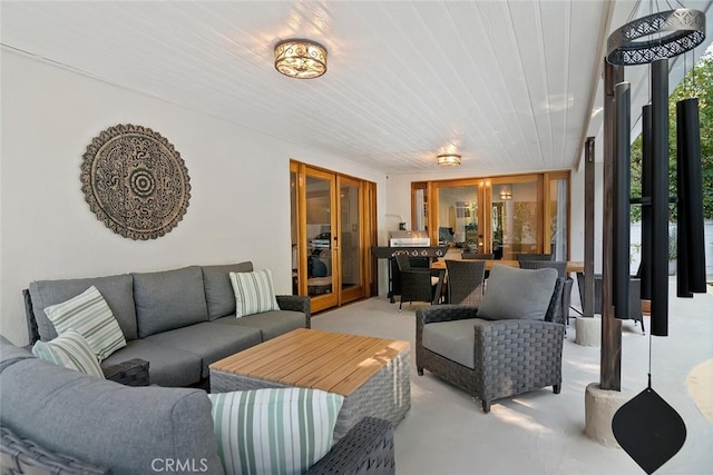 4816 Atoll Ave, Sherman Oaks, CA 91423 - living room with french doors and finished concrete flooring