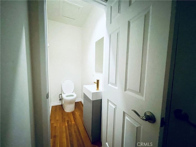4816 Atoll Ave, Sherman Oaks, CA 91423 - bathroom featuring toilet, wood finished floors, and vanity