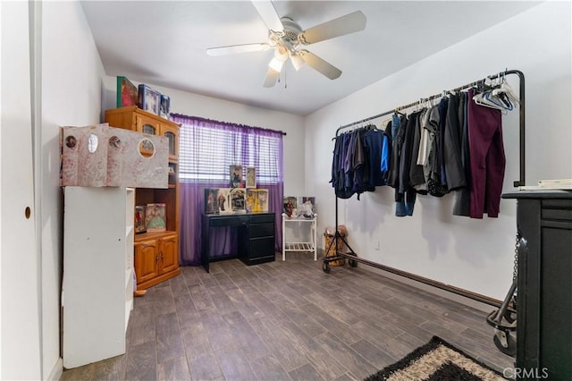 interior space with ceiling fan and wood finished floors