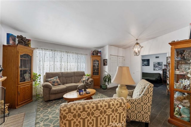 living room featuring an inviting chandelier