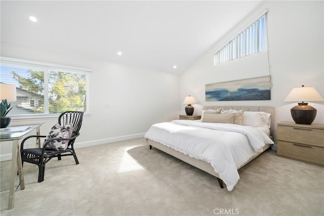 bedroom with lofted ceiling, recessed lighting, baseboards, and light colored carpet