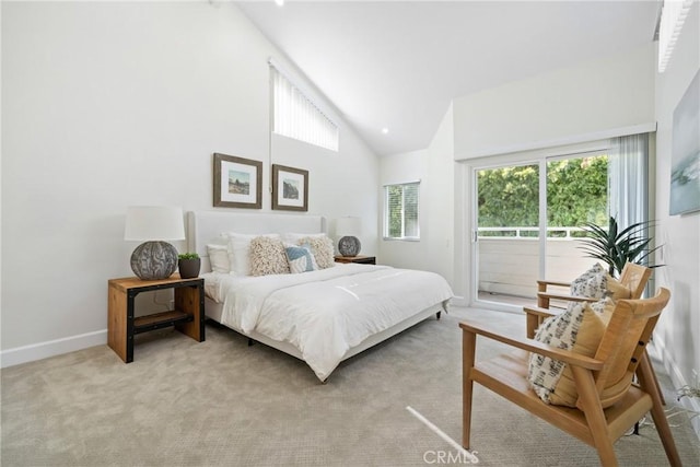 bedroom featuring access to exterior, light carpet, high vaulted ceiling, and baseboards