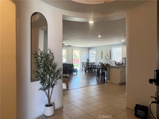 interior space featuring recessed lighting and light tile patterned flooring