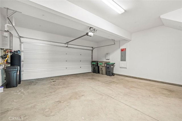 garage with baseboards, electric panel, and a garage door opener