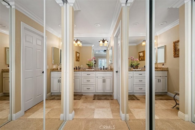 full bathroom featuring ornate columns, baseboards, crown molding, and vanity