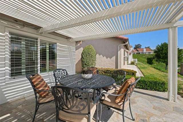 view of patio / terrace featuring outdoor dining area and a pergola